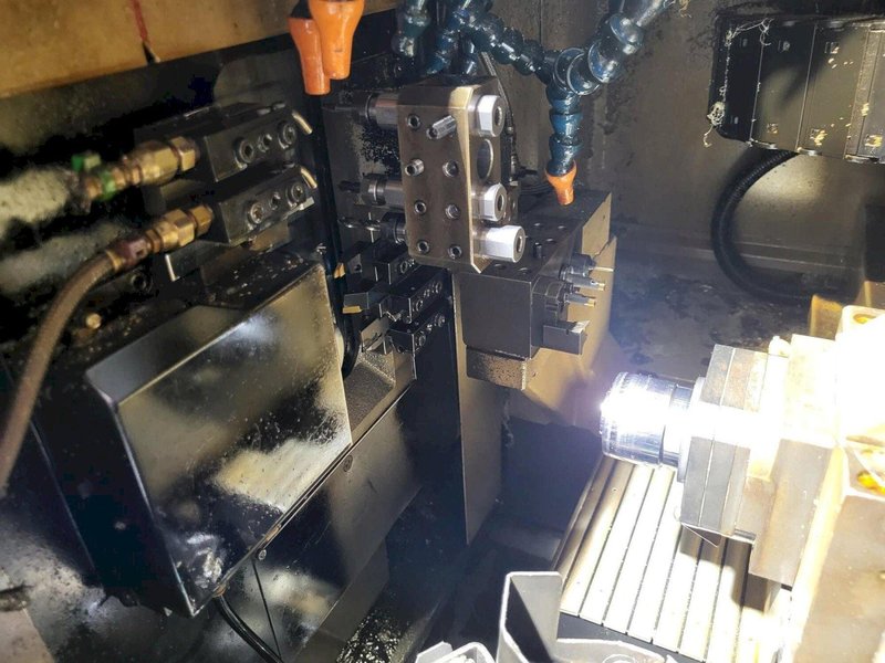 Tsugami B0205-II 5-Axis CNC Swiss Lathe, 2013 – Fanuc OI-TD Control, Edge Bar Feeder, High Pressure Coolant, Chip Conveyor