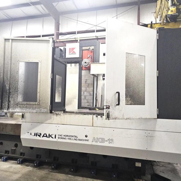 Kuraki AKB-13 5″ Spindle Horizontal Boring Mill, 2015 – Fanuc 0iMB Control 5 Axis Control, 60 ATC, 1000 psi TSC, Rigid Tap, Full B Axis 360 Degree Rotary Table, Barnes Chip/Coolant Separator w/ Lift Up Conveyor