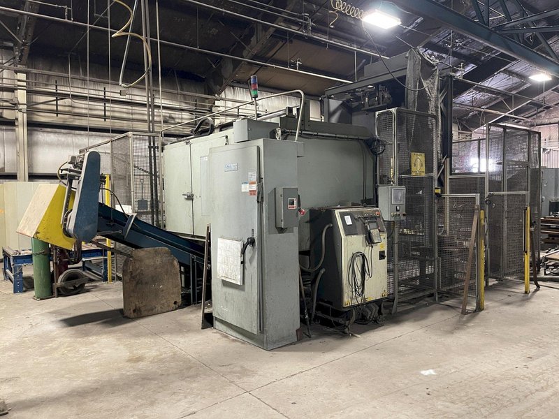 2005 Eagle automated saw and knockout system s/n 05027 with enclosure with light curtain, 2005 Fanuc robot model M-900iA 350 s/n r05743652 with Fanuc system R-J3iB controls s/n e05608535, with saw grips, Eagle enclosure with core knockout system, Allen Bradley plc with panelview 700, core butt discharge conveyor with drive, gate and riser dropoff, related conveyors