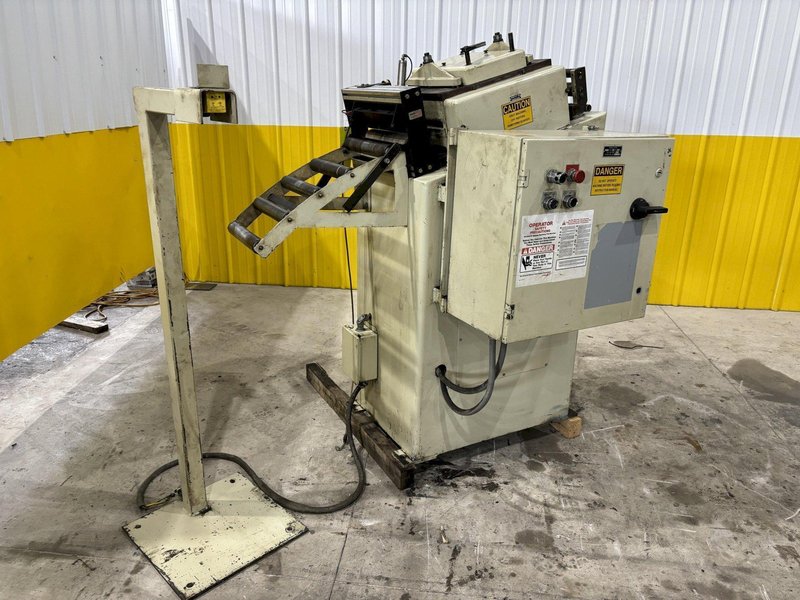 12" X .125" CWP MODEL #SE12B MOTORIZED COIL STRAIGTHENER. STOCK # 1007324