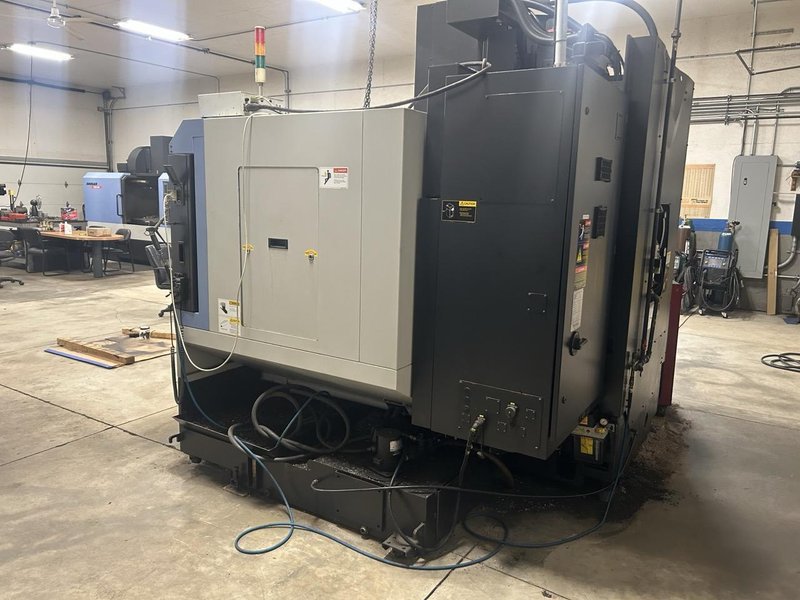Doosan DNM 500 VMC, 2009 – 4th Axis Wired, Fanuc Control