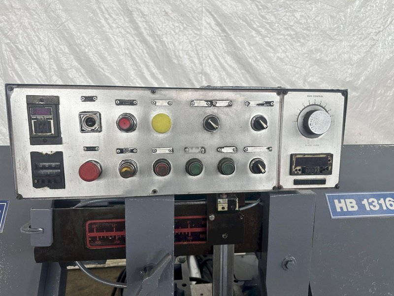 13" X 16" PEERLESS HB1316A HORIZONTAL BAND SAW W/ 10' INFEED AND 20' OUTFEED CONVEYOR. STOCK # 1164323.
