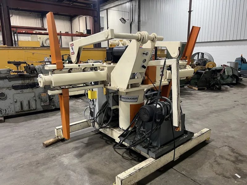 FEEDLEASE 4,000 LB X 24" WIDE DOUBLE END MOTORIZED COIL REEL, STOCK# 14260T