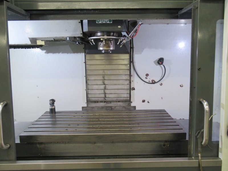 Haas VF-5/50 CNC Vertical Machining Center, Haas NextGen CNC Control, 4th Axis, TSC, Probing, HSM, 30 ATC- Auction Item