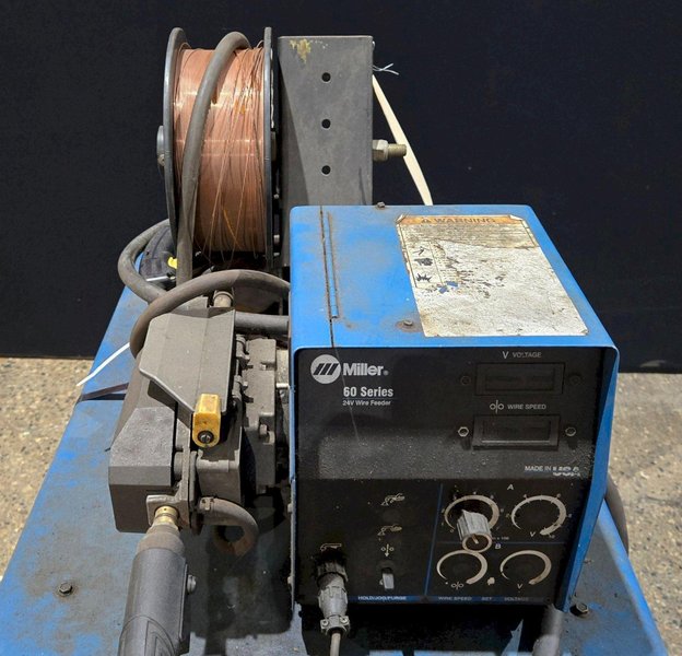 MILLER CP-302 MIG WELDERWITH 60 SERIES 24V WIRE FEEDER USED