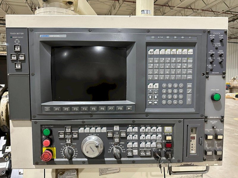 2002 OKUMA IMPACT LU-15 TWIN TURRET CNC LATHE USED