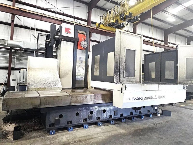 Kuraki AKB-13 5″ Spindle Horizontal Boring Mill, 2015 – Fanuc 0iMB Control 5 Axis Control, 60 ATC, 1000 psi TSC, Rigid Tap, Full B Axis 360 Degree Rotary Table, Barnes Chip/Coolant Separator w/ Lift Up Conveyor