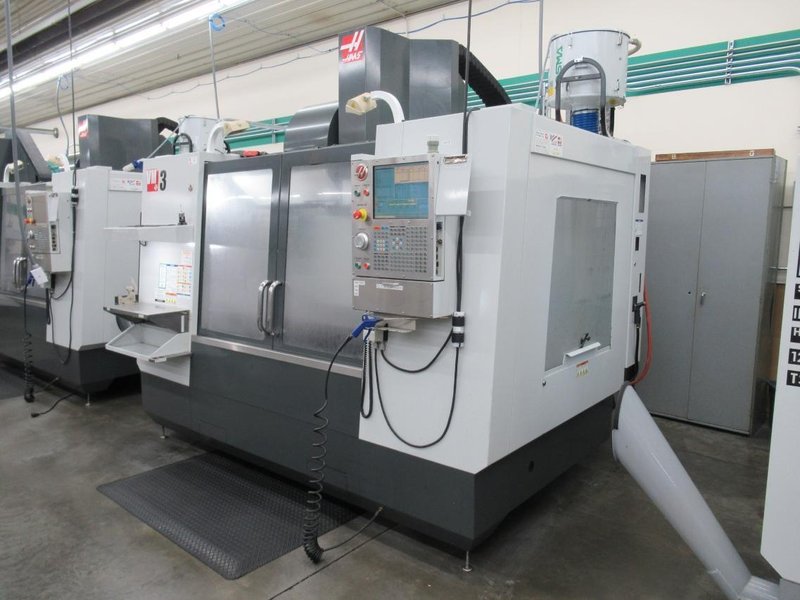 Haas VM-3 CNC Vertical Machining Center, Haas MainCon Ctrl, 4th &amp; 5th Axis Drive, 1000 PSI TSC, Probing, High Speed Machining, 24+1, RJH- Auction Item