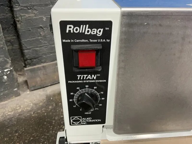Allied Automation Inc  Roll Machine  - 1055 Rollbag Semiauto