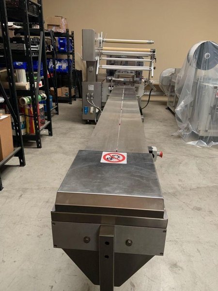 Mainline Industries Phantom Horizontal Bottom Seal Flow Wrapping Machine, 2020 – Never Used *PRICE DROPPED*
