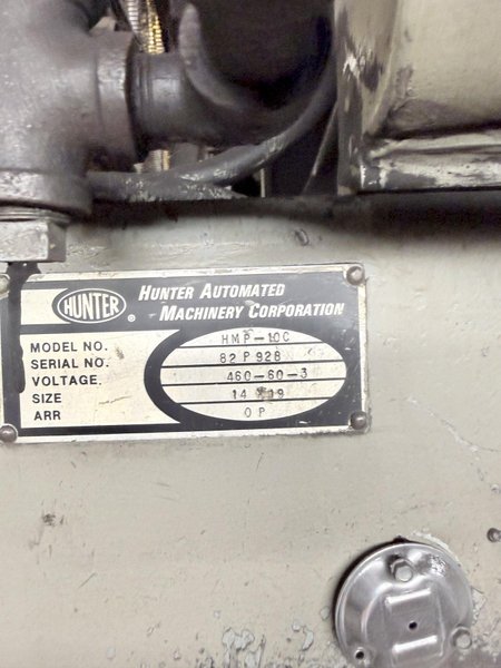 Hunter model hmp 10C automatic molding machine s/n 82P928, op. with Emerson PLC, feed belt