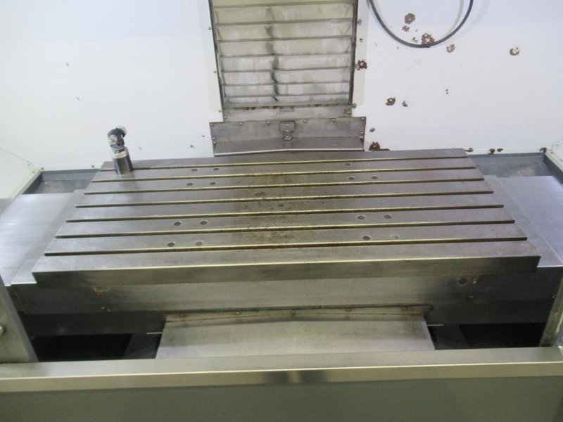 Haas VF-5/50 CNC Vertical Machining Center, Haas NextGen CNC Control, 4th Axis, TSC, Probing, HSM, 30 ATC- Auction Item