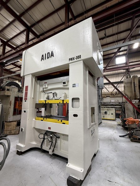 300-ton Aida PMX-L2-300(1) Used Straight Side Mechanical Stamping Press For Sale, "New" Press Controls Included. Year 1990