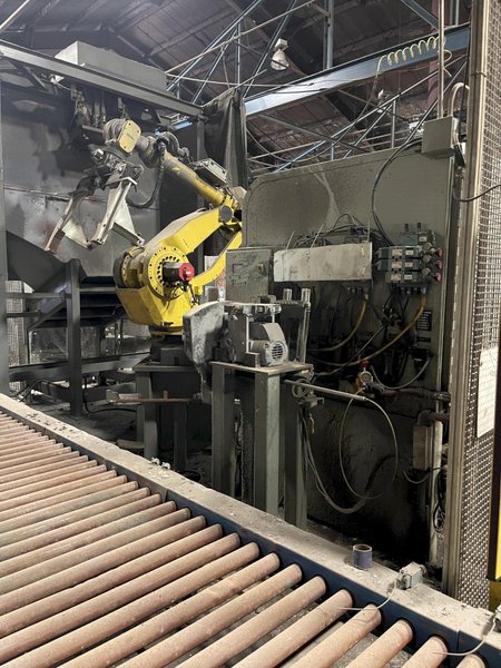 2005 Eagle automated saw and knockout system s/n 05027 with enclosure with light curtain, 2005 Fanuc robot model M-900iA 350 s/n r05743652 with Fanuc system R-J3iB controls s/n e05608535, with saw grips, Eagle enclosure with core knockout system, Allen Bradley plc with panelview 700, core butt discharge conveyor with drive, gate and riser dropoff, related conveyors