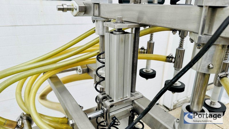 Inline Filling Systems  | Six-Headed Semi-Automatic  |  Overflow Filler