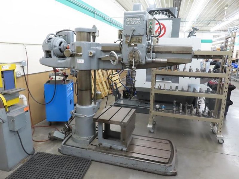 Cincinnati Bickford 4' x 9" Radial Arm Drill, Box Table, Power Elevation, Power Quill Feed, Coolant- Auction Item