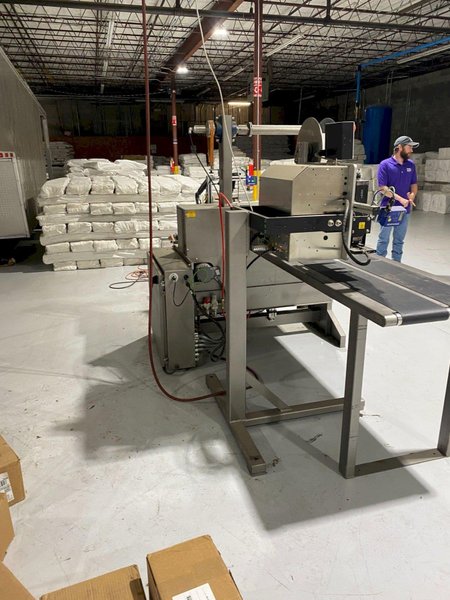 System Packaging 900-24 3B Labeler, 2020 – Weber Box Label Printer/Applicator Model: 5300 L.H. DOM, 1 Pallet of Cold Seal Material Included **Pre-Removal Pricing**