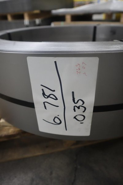 Coiled Cold Rolled Steel Material (5 Coils), (2) Approx 1.25" x .060", (2) 22.125" x 11Ga,  (1) 6.781" x .035"- Auction Item