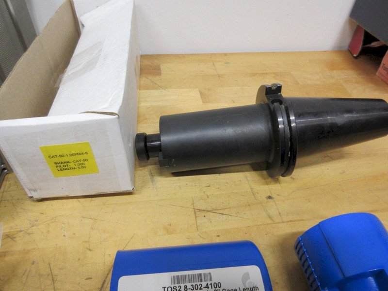 Mill Tool Holders Assorted CAT50, BT40, NMTB40, ER40 Collets, TG100 Collets, and 18x13x6" SST Wire Parts Basket- Auction Item