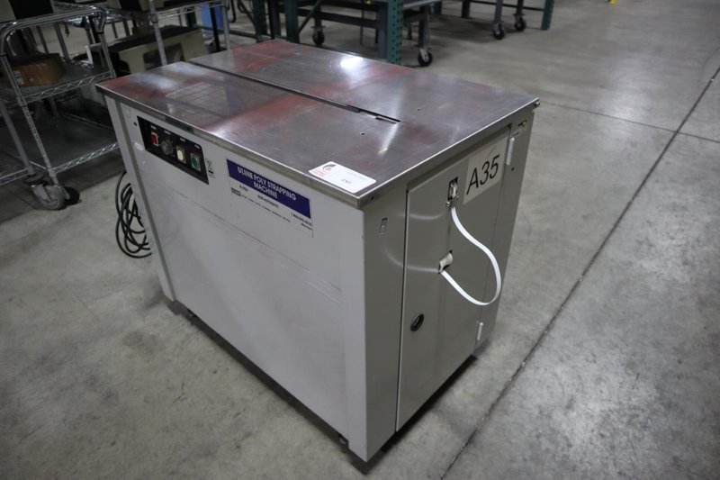 ULINE H-959 Poly Strapping Machine, Semi-Automatic, Portable on Casters- Auction Item