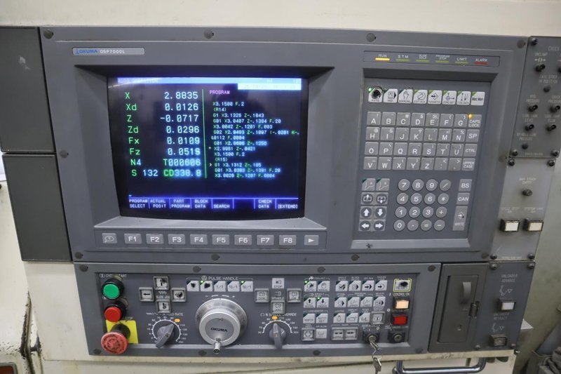 Okuma LB15 II CNC Lathe Turning Center, OSP700L CNC, 12 Station Turret, Tailstock, 8&quot; Chuck, Chip Conveyor- Auction Item