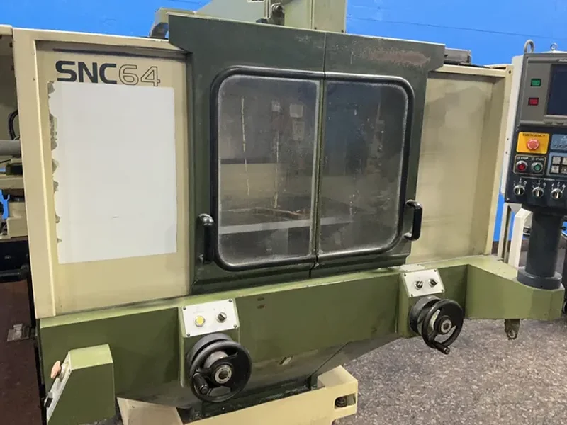 MAKINO MILLING MACHINE CO., LTD. 18”X32” TABLE CNC VERTICAL MACHINING CENTER  -  SNC64-A5