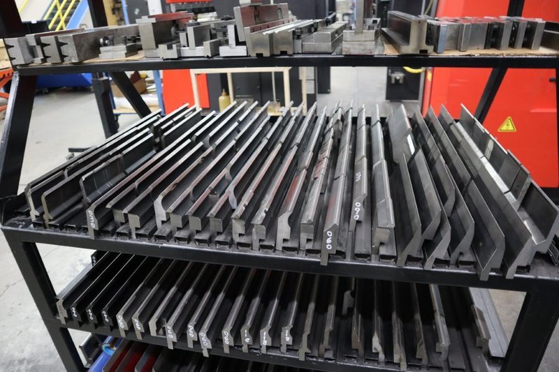 Press Brake Dies and Lower Die Holders for Amada Press Brakes on Welded Steel Shelving- Auction Item
