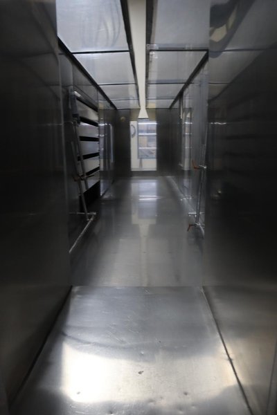 Parker Ionics GX7000M Automated Powder Coating Booth with 24" Wide x 48" High Windows and Top Chain Slot- Auction Item