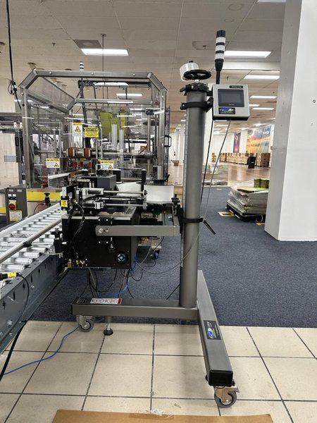 Complete Packaging Line for trays / flat Product including Custom Conveyor System, (2) Texwrap L-Bar Sealers and Heat Tunnels, Econocorp Automatic Cartoner and Case Packer and CTM Case labeler, 2023