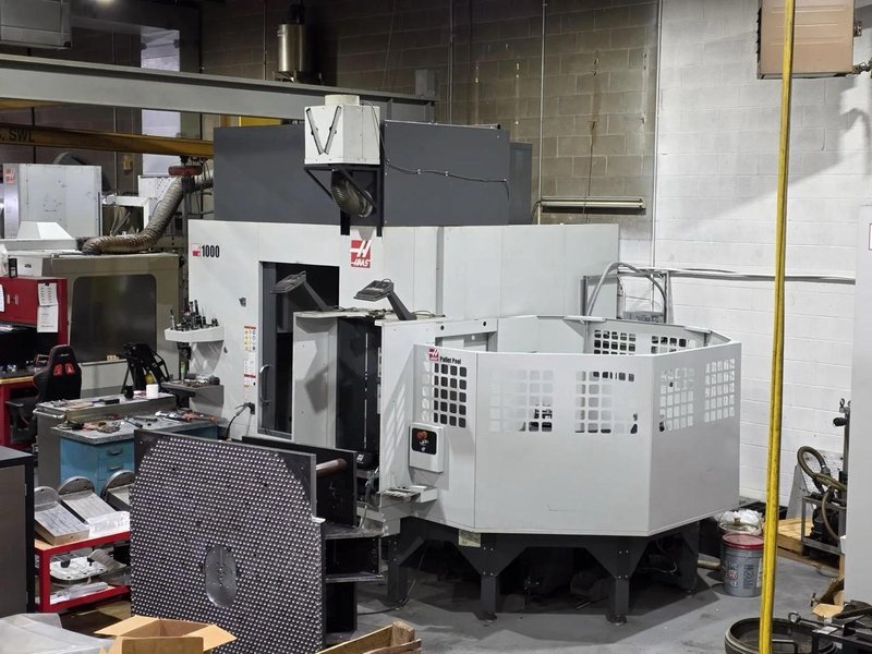 Haas UMC-1000 5-Axis CNC UMC, 2021 – 10-Pallet Changer, 15,000 RPM Spindle, WIPS, Through-Spindle Coolant, Chip Conveyor, Rigid Tapping