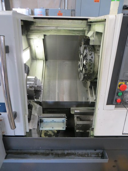 Okuma Genos L250E CNC Turning Center, OSP-P300L/R CNC Control, 8&quot; Chuck, Tool Setter, Parts Catcher, 12-Station Turret, Tailstock, Chip Conveyor