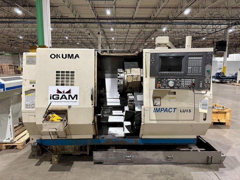 2002 OKUMA IMPACT LU-15 TWIN TURRET CNC LATHE USED