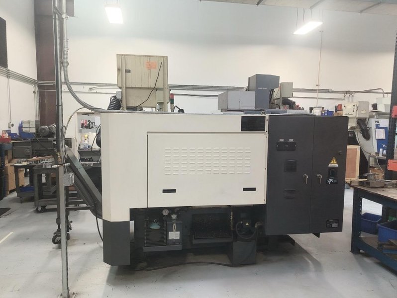 Hwacheon Hi-Tech 200A CNC Lathe, 2009 – Fanuc Oi-TC Control, Mist Buster, Chip Conveyor and Tailstock