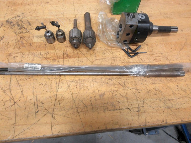 R8 Tool Holders, (1) Valu-Bore Offset Boring Head 4" x 1", (1) Jacobs #32 Keyed Chuck, (2) Bridgeport 2J Draw Bars *New and Used*,  (2) Jacobs 7B Keyed Chucks- Auction Item