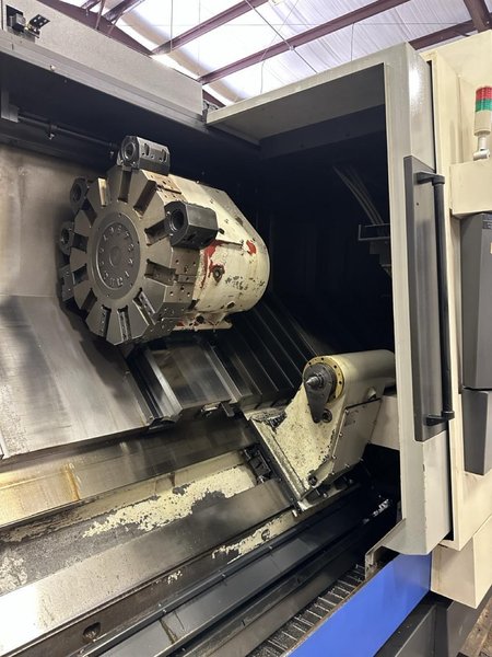 Hwacheon Hi-Tech 700 CNC Lathe, 2012 – 24″ Chuck, Tailstock, Chip Conveyor, Tool Presetter