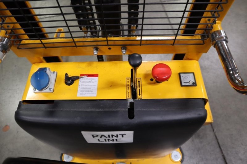 Uline H-2651 Electric Straddle Stacker Lift, 2,200# Cap, 63&quot; Max Height, 50&quot; Between Outriggers, 12 Volt Battery with Charger, 42&quot; Forks- Auction Item