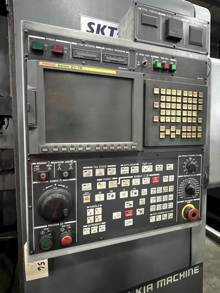 HYUNDAI KIA 31.5&quot; CNC VTL WITH LIVE TOOLING AND 15&quot; 3 JAW CHUCK, FANUC 21iT CONTROL, MODEL SKT-V5RM, NEW 2009