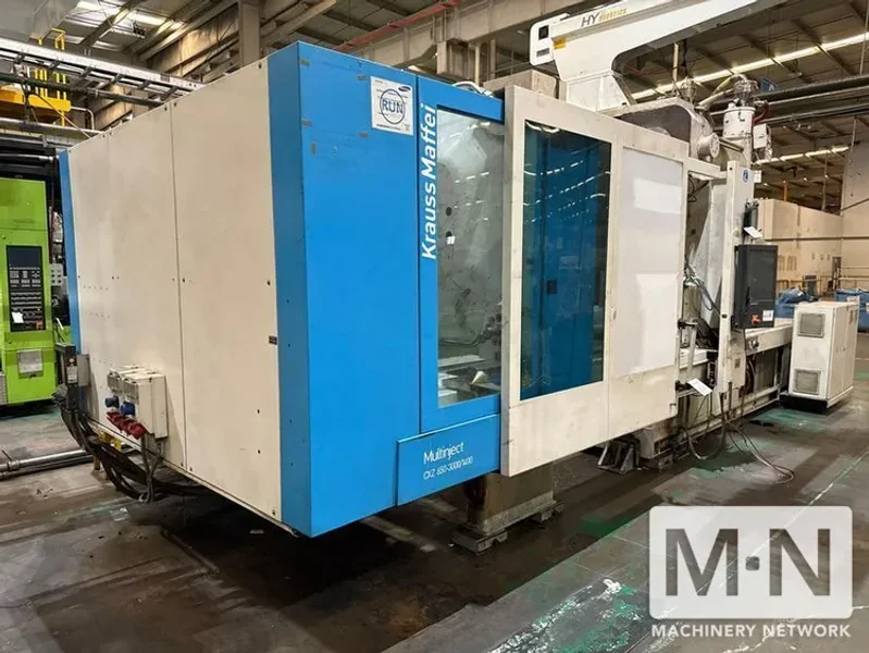 650 TON 58/39.5 OZ KRAUSS MAFFEI MODEL KM650-300-400CKZ 2-COLOR INJECTION MOLDING MACHINE MFG 2010