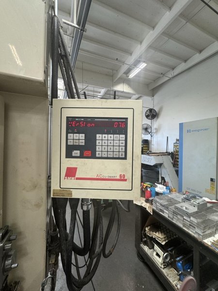 Okuma MC-V4020 VMC, 2005 – 4th Axis Rotary, Chip Conveyor