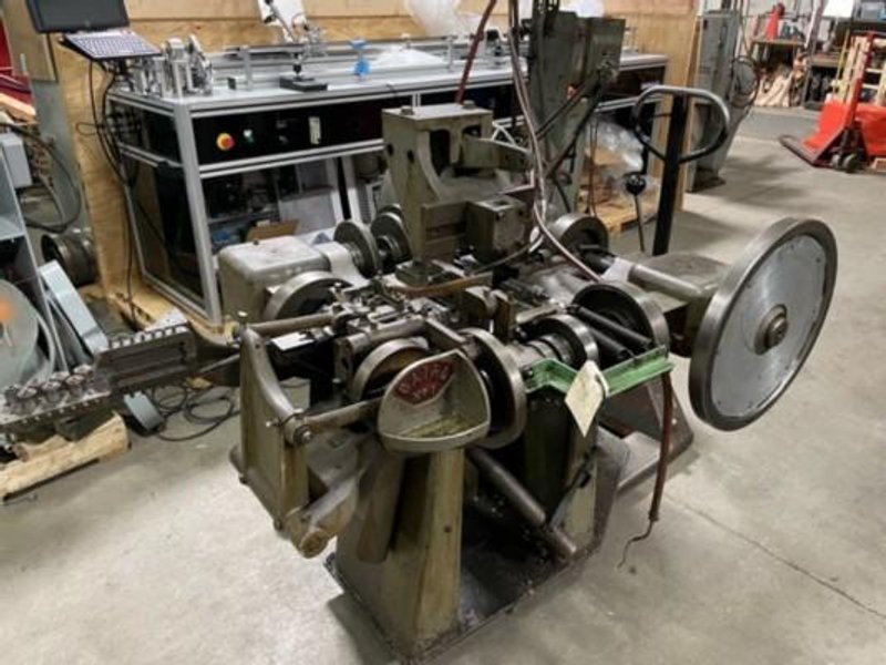 BAIRD #1 FOUR SLIDE MACHINE