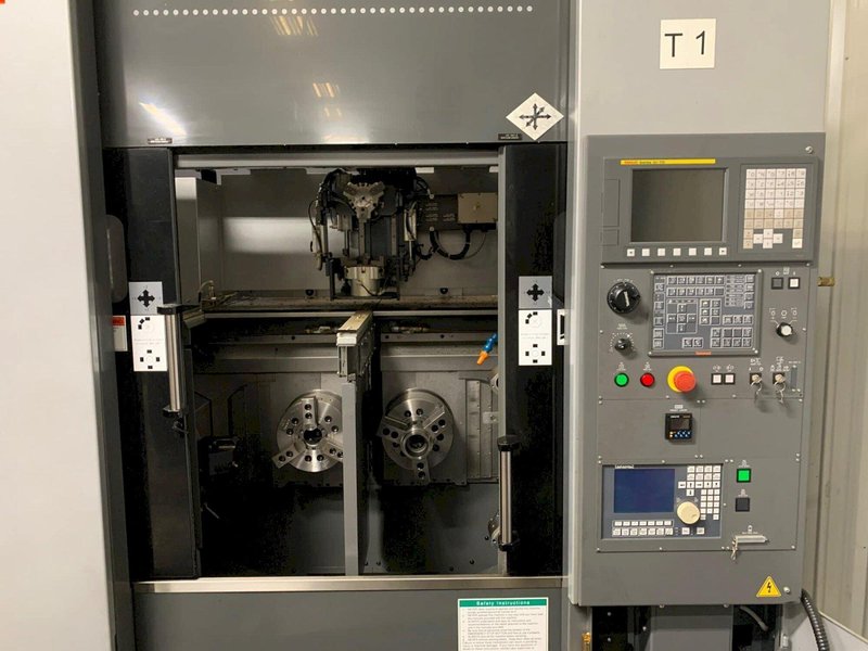 Takamaz XW-130 Twin-Spindle CNC Turning Center, 2016 – GTH150 Gantry Loader, Fanuc 0i-TD &amp; 16-Station Stocker