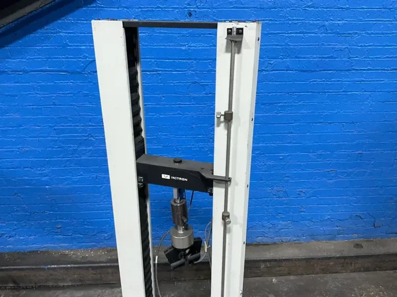 INSTRON SINGLE COLUMN ELECTROMECHANICAL UNIVERSAL TESTING MACHINE   -  1011
