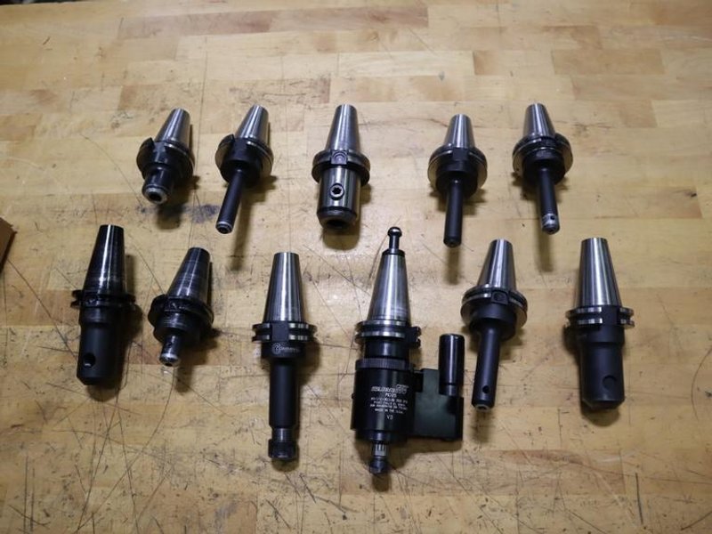 Command CT 40 Taper Tool Holders: (1) Tapmatic Head, (1) ER20 Collet Holder, (9) End Mill Holders- Auction Item