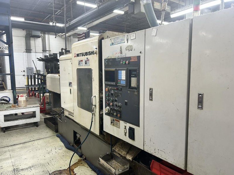 Mitsubishi M-T35E CNC Multi-Spindle Automatic Lathe, 1995 – Chip Conveyor, Bar Feeder