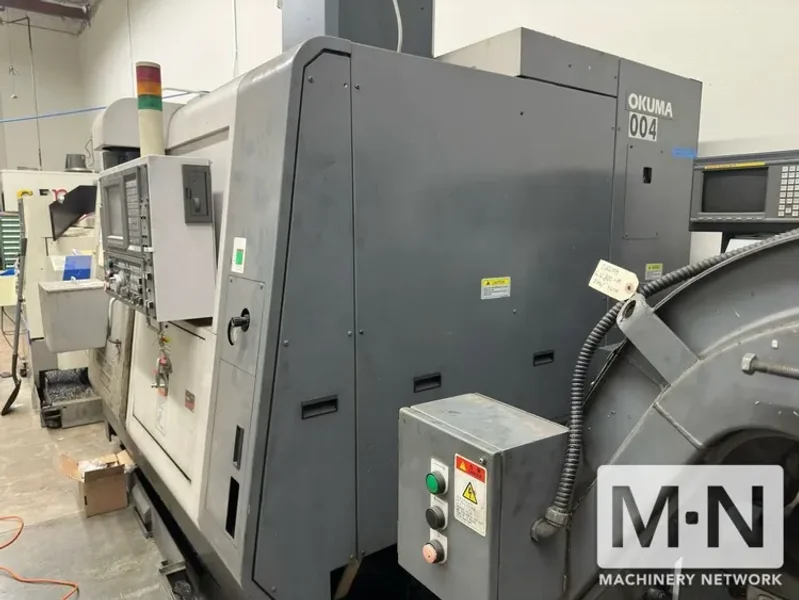 Okuma Simulturn LU300-M CNC Lathe, 2004 w/ Barfeeder