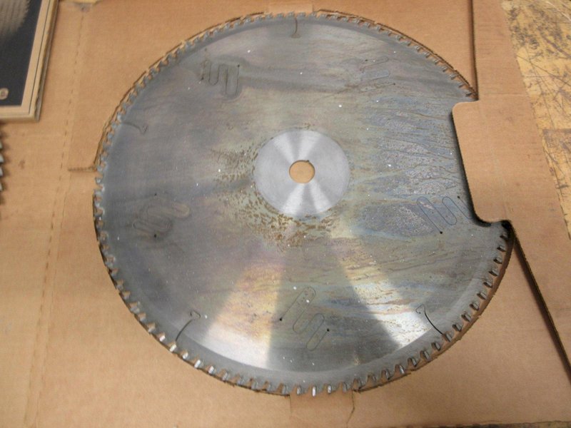 Cut-Off Saw Blades (4) Carbide Tipped Nap Gladu, Leuco and Other 16" x 1" **Used But Still Sharp**, (1) Hitachi 15" x 1" Wood Miter Saw Blade **Looks Unused**- Auction Item