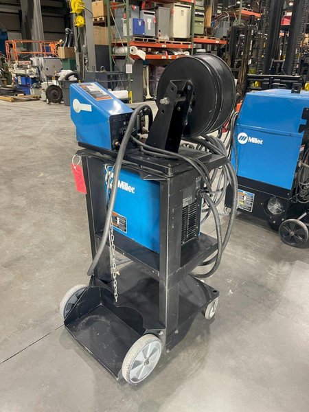 MILLER ALT 304 SERIES ARC WELDER WITH FEEDER USED