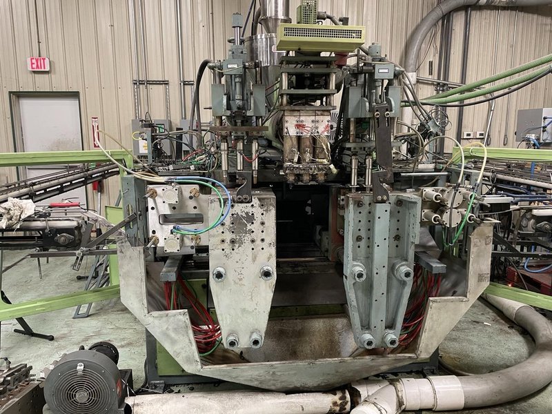 CMP 2000/DH/2 Extrusion Blow Molder, 2015 – Includes Leak Detector, Product Conveyor and Drive System
