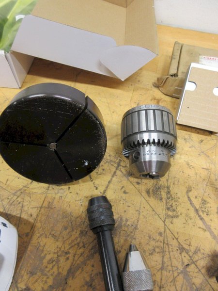 Haas 09-0051 40 Taper Spindle Wiper Set, New Jacobs #14N Keyed Chuck and Keys, Chick 2" Vise Jaws, 5C Emergency Collet, South Bend Lathe Cross Slide Feed Nuts- Auction Item