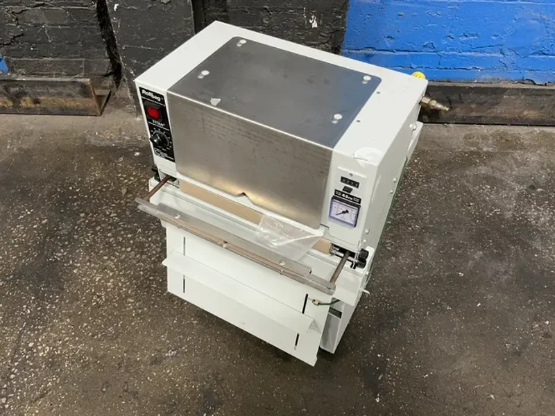 ALLIED AUTOMATION INC ROLL MACHINE   -  1055 ROLLBAG SEMIAUTO